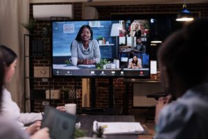 zoom meeting with focus on large screen TV